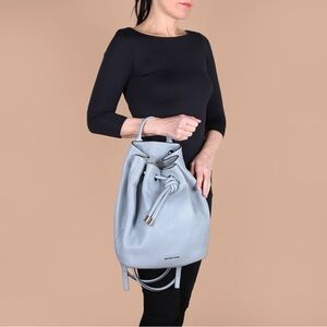 MICHAEL KORS
Dalia Large Grained Leather Bucket Backpack Light Blue